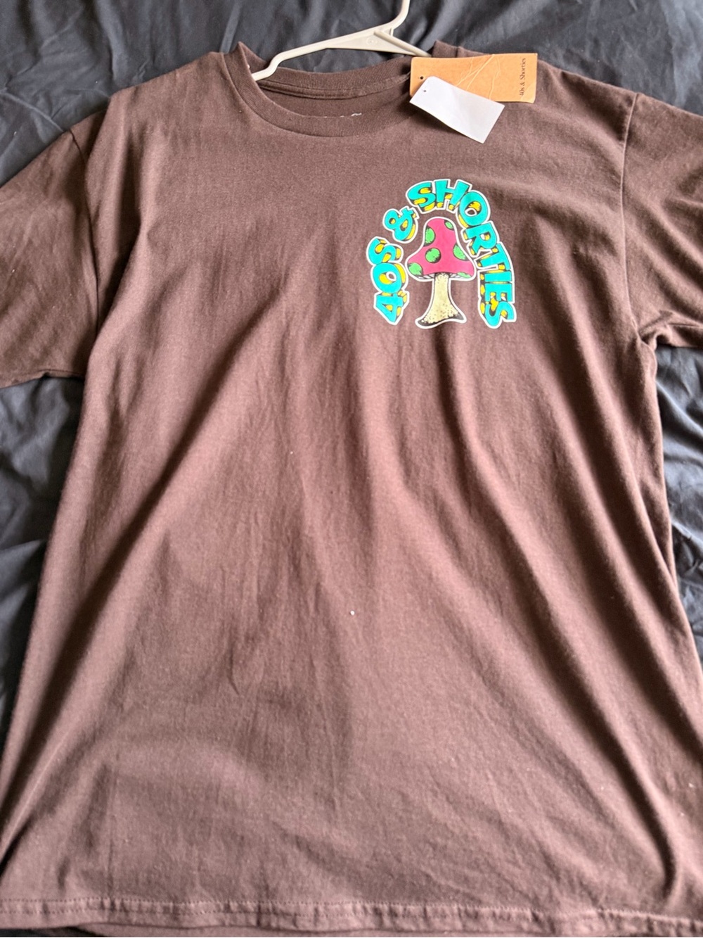 Brown Graphic Tee with Mushroom Logo